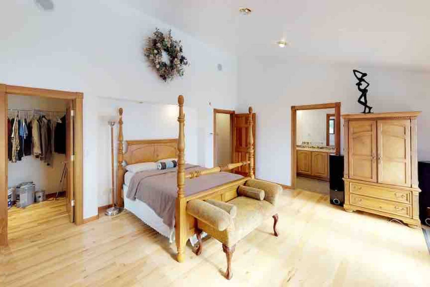 Primary master bedroom with four-poster bed