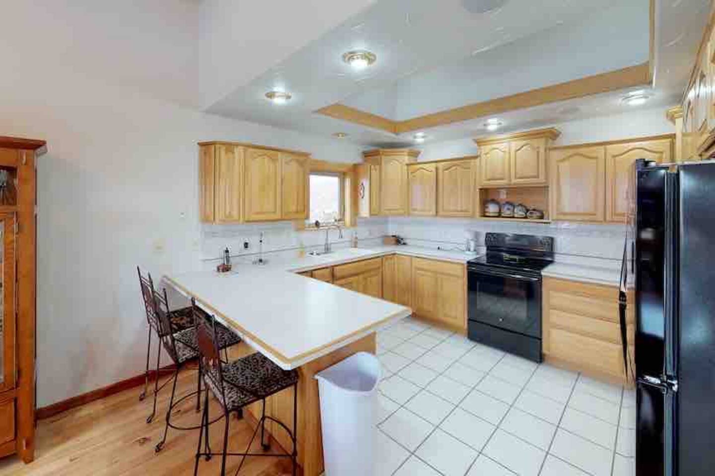 Kitchen with island bar seating